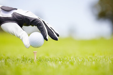 Person, place ball and hands on golf course, club and outdoor fitness for competition or games. Gloves, tournament and precision tee for practice match on field, position and professional athlete