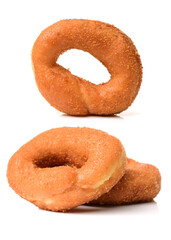 a pile of rosquillas, typical spanish donuts on white background