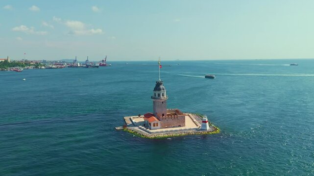 View a small island with a lighthouse.