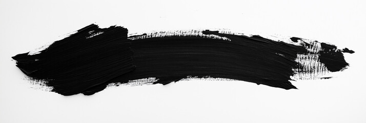 bright black brush stroke of paint on white background