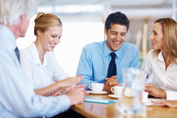 Business people, discussion or planning in meeting, conversation or teamwork for project. Group, employees or coworkers with brainstorming, support or cooperation for proposal, smile or collaboration