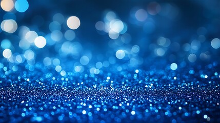 Fototapeta premium Elegant Blue Glitter Texture with Gradient Effect and Ample Copy Space, Ideal for Marketing Designs, Announcements, or Artistic Backgrounds