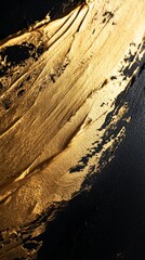 Abstract gold brush stroke texture on black canvas