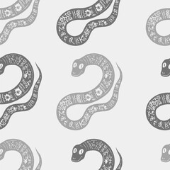 Seamless vector pattern decorated snake with Ukrainian embroidery, the animal symbol of 2025. Simple doodle style. Grid
