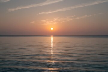Obraz premium Serene Sunset Over Tranquil Sea with Gentle Background Glow
