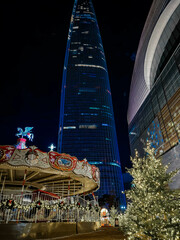 Christmas pine tree near Lotte World Tower. Seoul city, South Korea.