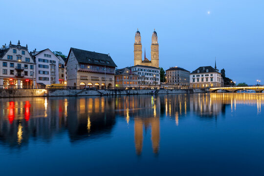 Historic architecture at the Limmat riverbank in Zurich at night