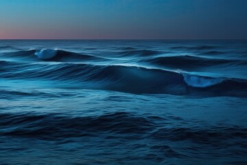Fototapeta premium Stunning Gradient Design of Deep Blue Twilight Ocean with Sparkling Waves on Isolated Background