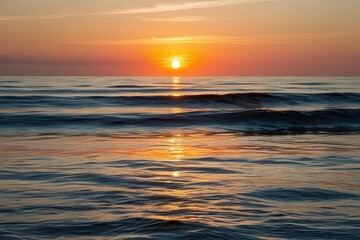 Fototapeta premium Tranquil Sunset Reflections on Glimmering Ocean Waves
