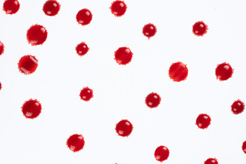 Abstract red and white background. Drops of red paint top view