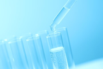 Laboratory test tubes on colored background