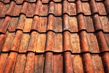 Old building red roof tile texture pattern.