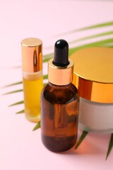 Natural cosmetic products on color background, top view