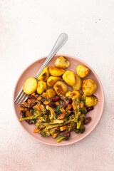 Stewed potatoes with stewed vegetables, broccoli and beans with carrots and herbs, a delicious hearty lunch or dinner