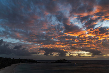 Scenic moody sunset over Anchors Bay on Lizard Island in Queensland, Australia.