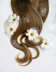 a strait and smooth hair isolated on background for hair care with a shampoo and flowers