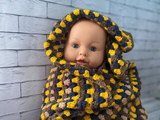 Cute baby doll in crochet handmade blanket photo cozy nice lovely home interior