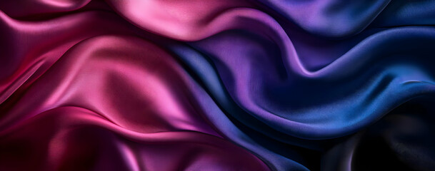 Obraz premium Elegant fabric texture showcasing rich, vibrant colors and smooth waves, perfect for fashion, design, or textile projects.