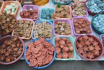 Variety of earthen lamps for sale on the occasion of Diwali, Festival of Lights.