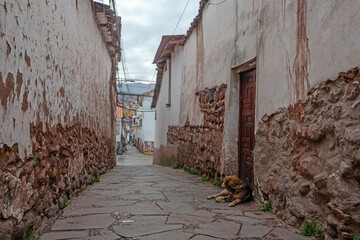 Ancient streets of Cuzco downtown, traditional stone buildings, Peru