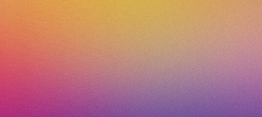 Fototapeta premium Abstract background featuring a grainy gradient going from yellow to orange, pink and purple