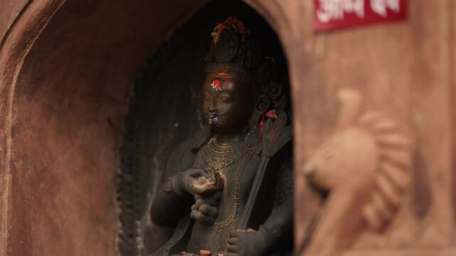 Statue of Hindu God Agni Dev in Temple of Nepal, Deity of Hindu God on the Wall of the Temple