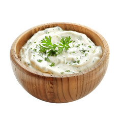 Wooden bowl of sour cream dip sauce.