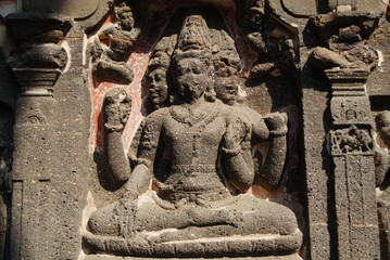 Lord Brahma, Vishnu and Mahesh (Shiva). The Great Kailasa (Cave 16) is attributed to Krishna I (c. 757-83 A.D.), the successor and uncle of Dantidurga. Ellora Caves, Aurangabad, Maharashtra, India. 