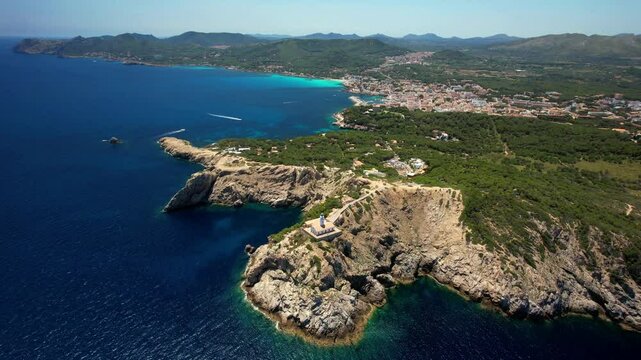 Mallorca (Majorca) island aerial scenery of cala Gat and  Agulla with lighthouse.. aerial drone 4k hd video. Spain