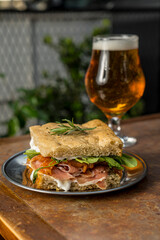 raw ham sandwich with beer ready to eat