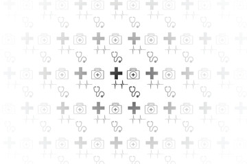 A seamless pattern of medical symbols, including crosses, stethoscopes, first aid kits, and EKG lines, representing healthcare, emergency services, and medical care.