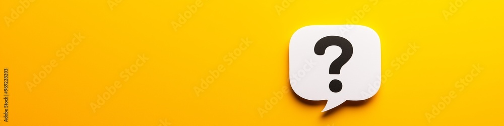 Poster a white question mark is on a yellow background. the question mark is on a piece of paper that is on