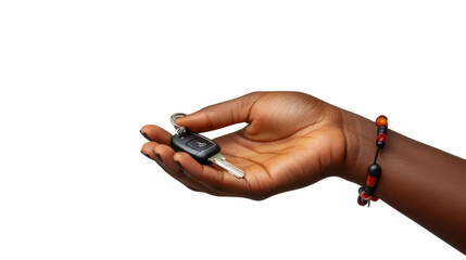 Hand holding car keys on transparent background