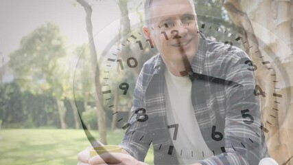 Animation of moving clock over caucasian man drinking coffee in park