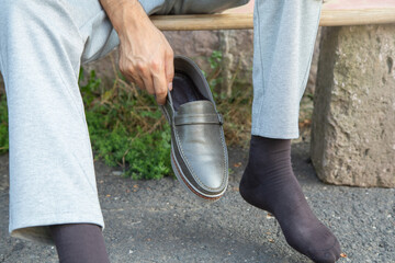 Caucasian man wearing modern shoe. Fashion