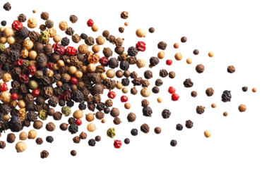 Captivating image of falling peppercorns highlighting their spherical forms and vibrant colors.