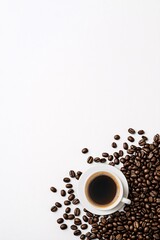 Naklejka premium coffee cup and coffee beans on a white background