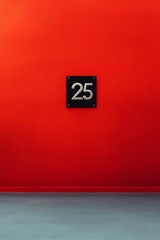 Number 25 on a vibrant red wall