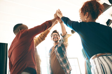 Creative, team and high five in office with energy, creativity and collaboration in business. Employees, synergy or gesture in workplace for community, inclusion or excited for cooperation with trust