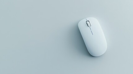 A sleek white computer mouse on a light surface, designed for ergonomic use.