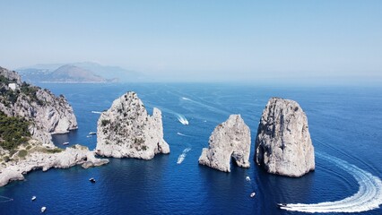 Aerial view of Faraglioni rock formations off the coast of Capri, Italy.