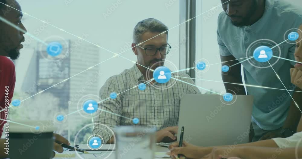 Poster animation of network of connections with icons over diverse colleagues using laptop in office