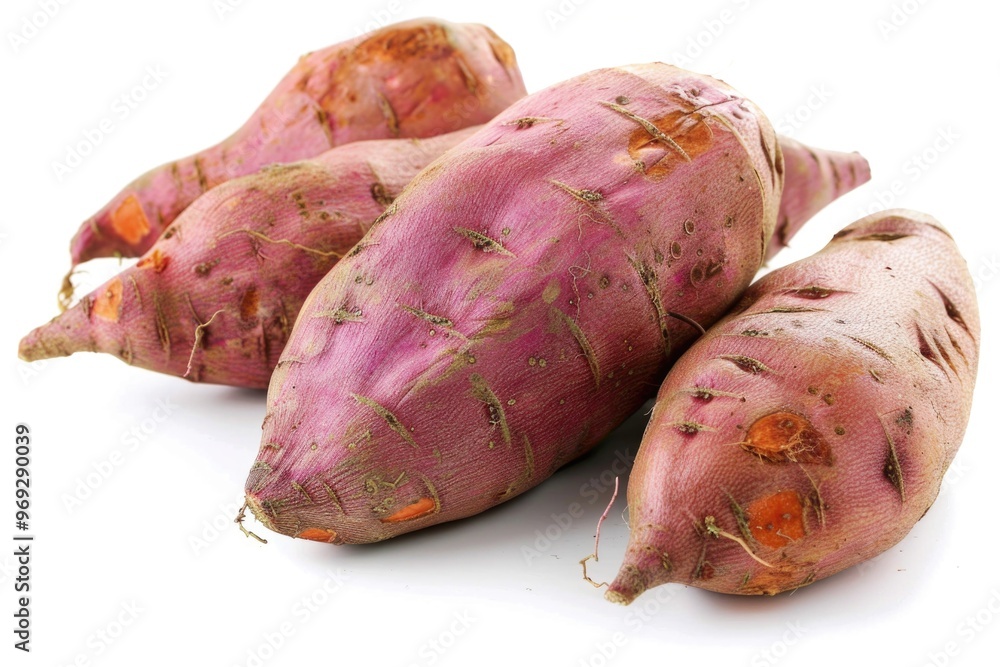 Poster A group of sweet potatoes arranged on a clean and flat white surface