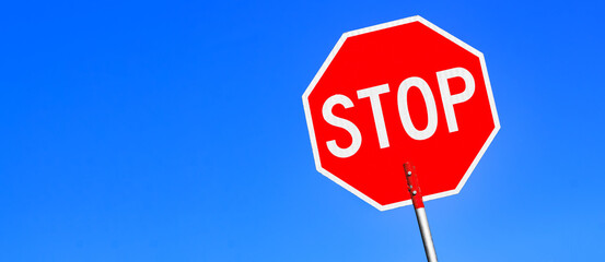 Stop sign and blue sky
