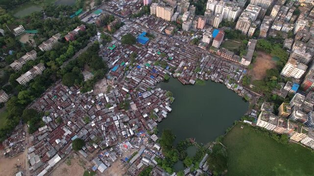 Aerial footage of the overpopulated slum area of Karail at sunset in Dhaka, Bangladesh