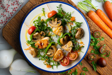 Turkey skewers with mushrooms and vegetables. Top view table.