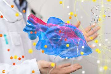 A doctor interacts with a digital 3D model of a human heart showcasing advancements in medical...