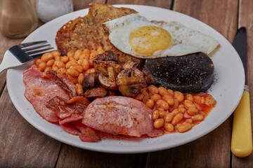 Fried English breakfast including black pudding.