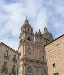 Fototapeta premium View of the Clerecia Church and the Casa de las Conchas in Salamanca, Spain