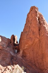 Red rock formations under a clear blue sky
